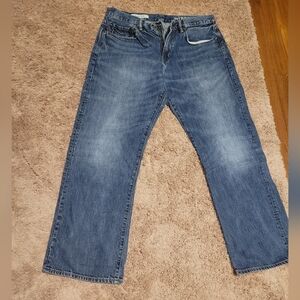 Men's blue jeans, size 34, width 32, length 32, classic style.